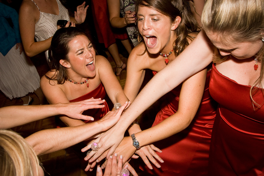 dancing red bridesmaids